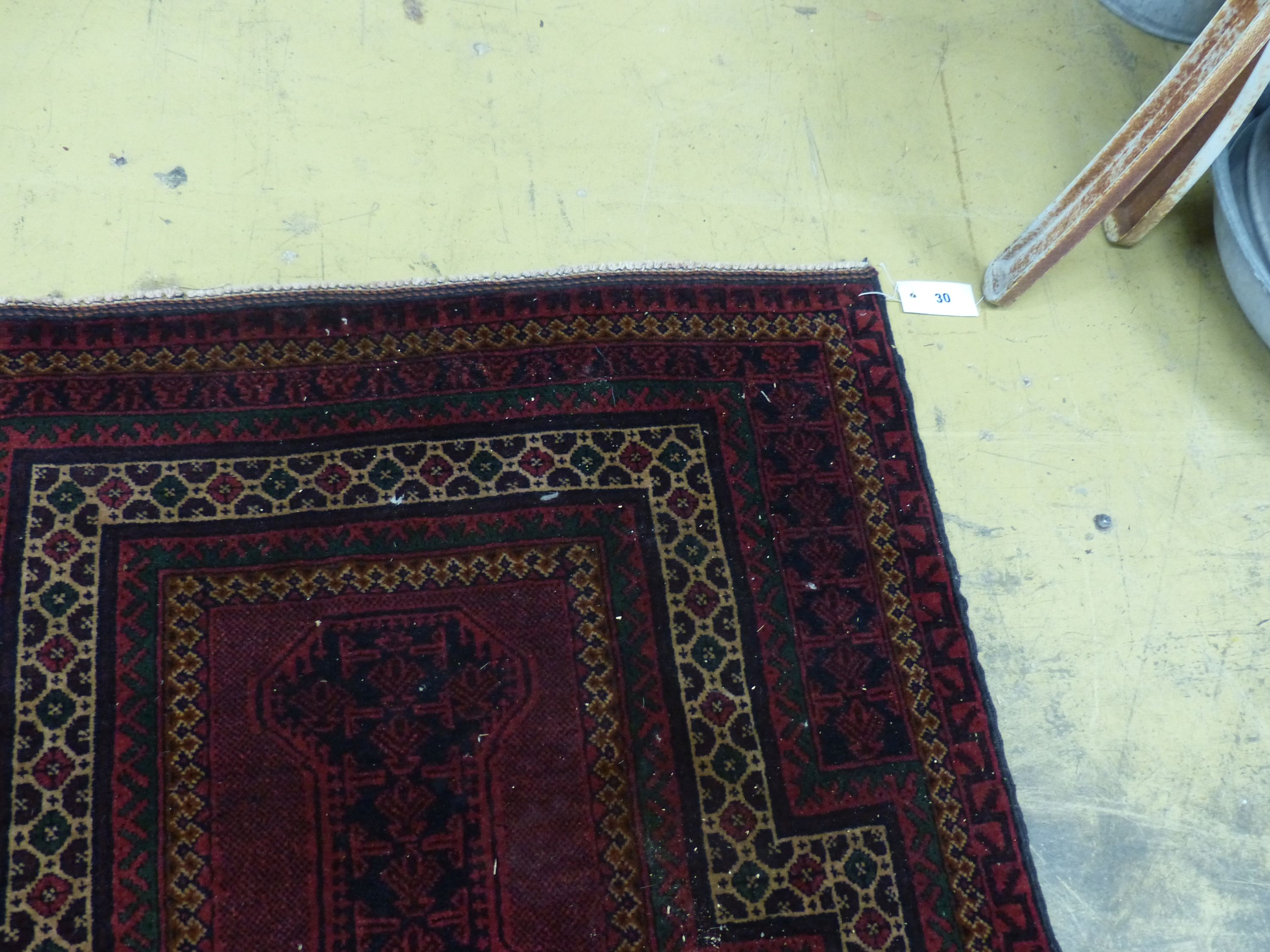 A Belouch red ground prayer rug, 146 x 90cm
